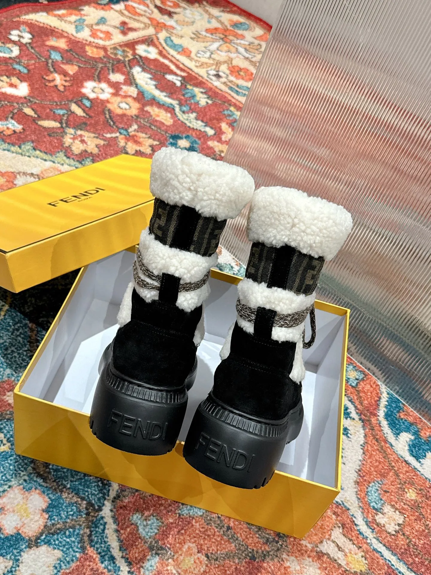 APRES CHIC WHITE SHEARLING AND BLACK SUEDE BOOTS